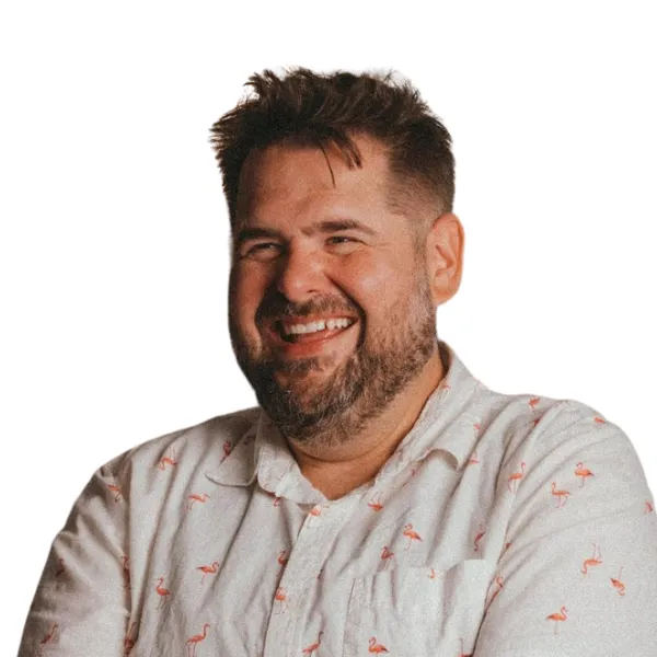 Chris Goldby, founder of The Hickory Algorithm, smiling in a flamingo-print shirt
